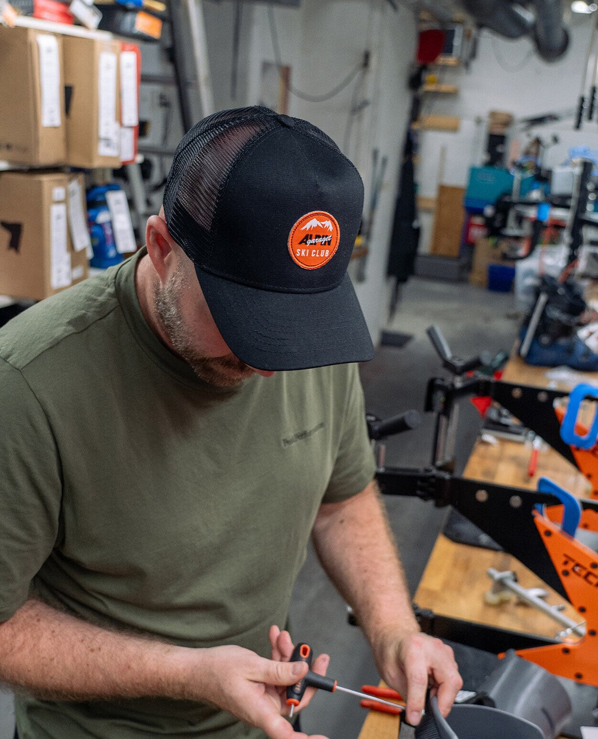 Alpingaraget Ski Club LTD - Svart/Orange